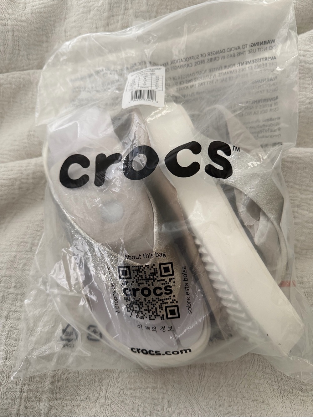 CROCS Metallic Silver Slide Sandals with White Sole